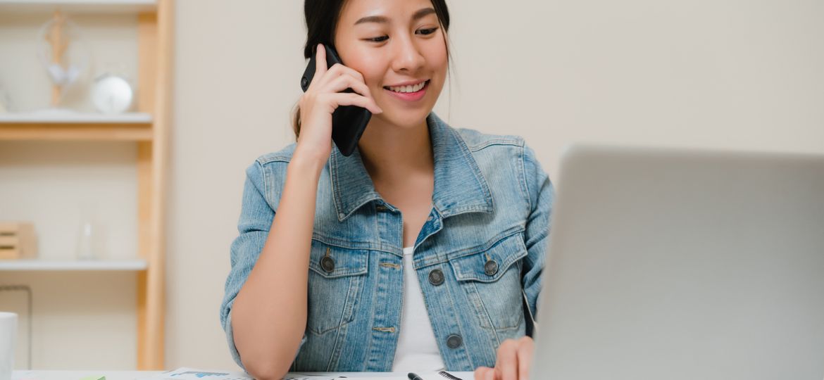 Beautiful smart business Asian woman in smart casual wear workin